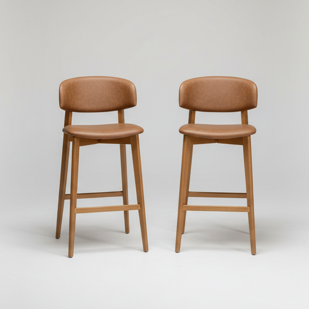 Two brown bar stools on a white background